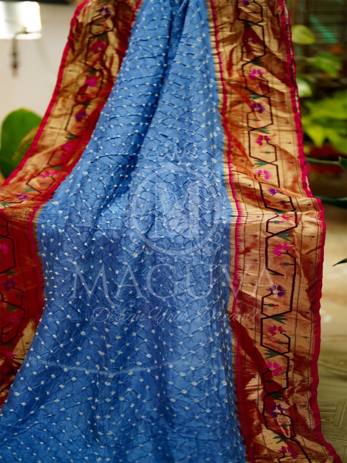 Elegant Sky Blue Bandhani Silk Saree with Golden Red Border
