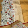 Golden Linen Saree with Hand-Painted Floral Design & Red Border